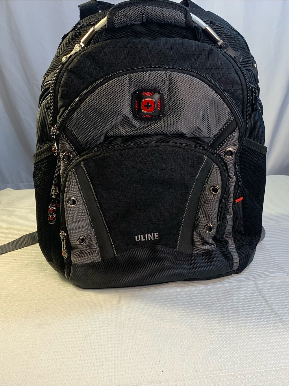 Uline Swiss Gear Black and Gray Men's Backpack - Durable Travel & Work Bag. EC
